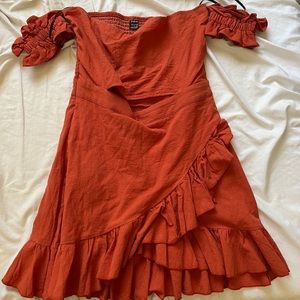 Bright rust/red dress with ruffles